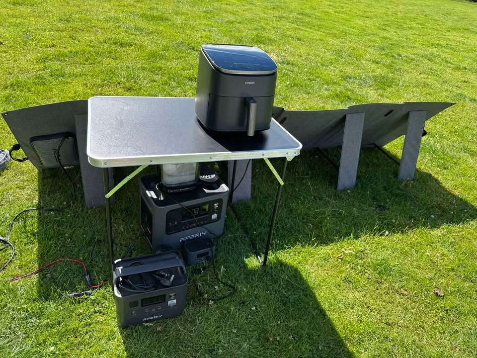 Jon Witcombe using an AFERIY power station and solar panel for outdoor cooking
